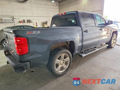 Trzecie zdjęcie samochodu z tyłu: 2017 CHEVROLET SILVERADO K1500 LT VIN:3GCUKREC7HG374888 - miniatura