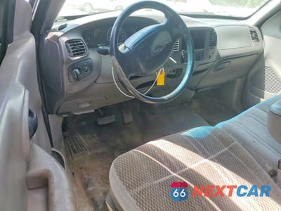 Zdjęcie 8 z 12 samochodu: 1999 FORD F150 VIN:1FTZF1725XNA91427 - miniatura