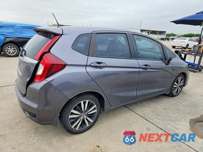 Trzecie zdjęcie samochodu z tyłu: 2019 HONDA FIT EXL VIN:3HGGK5H91KM713726 - miniatura