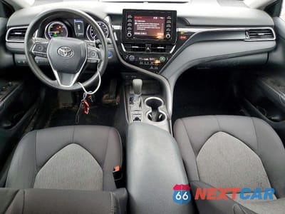Zdjęcie 8 z 12 samochodu: 2021 TOYOTA CAMRY HYBRID LE VIN:4T1C31AKXMU031115 - miniatura