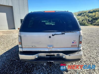 Zdjęcie 6 z 12 samochodu: 2004 GMC YUKON XL DENALI VIN:1GKFK66U24J203624 - miniatura