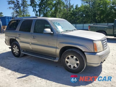 Czwarte zdjęcie samochodu z boku: 2002 CADILLAC ESCALADE LUXURY VIN:1GYEK63N62R111221 - miniatura