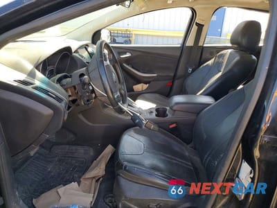 Zdjęcie 7 z 11 samochodu: 2014 FORD FOCUS TITANIUM VIN:1FADP3N26EL264506 - miniatura