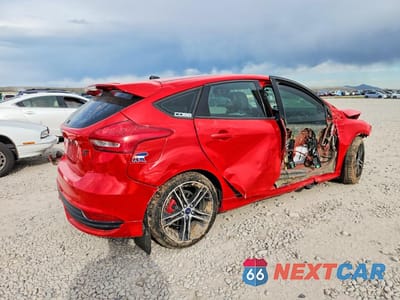Trzecie zdjęcie samochodu z tyłu: 2015 FORD FOCUS ST VIN:1FADP3L95FL299670 - miniatura