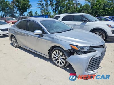 Czwarte zdjęcie samochodu z boku: 2023 TOYOTA CAMRY LE VIN:4T1C11AK2PU144860 - miniatura