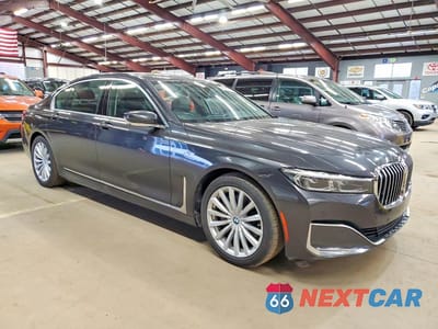 Czwarte zdjęcie samochodu z boku: 2022 BMW 740 I VIN:WBA7T2C09NCH24241 - miniatura