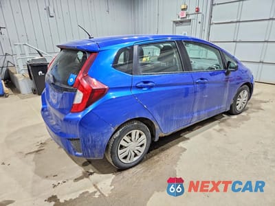 Trzecie zdjęcie samochodu z tyłu: 2015 HONDA FIT LX VIN:3HGGK5H50FM735395 - miniatura