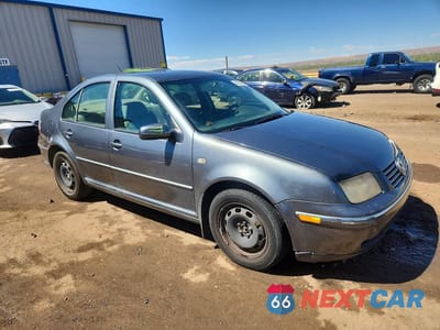 Czwarte zdjęcie samochodu z boku: 2004 VOLKSWAGEN JETTA GL TDI VIN:3VWRR69M34M111244 - miniatura