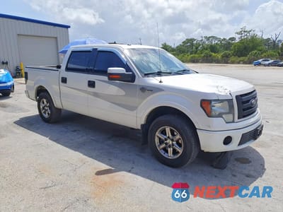 Czwarte zdjęcie samochodu z boku: 2012 FORD F150 SUPERCREW VIN:1FTFW1E65CFA72129 - miniatura