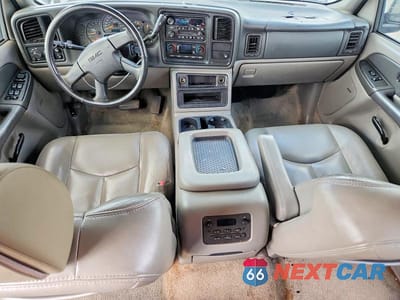 Zdjęcie 8 z 13 samochodu: 2003 GMC YUKON VIN:1GKEC13ZX3J337291 - miniatura