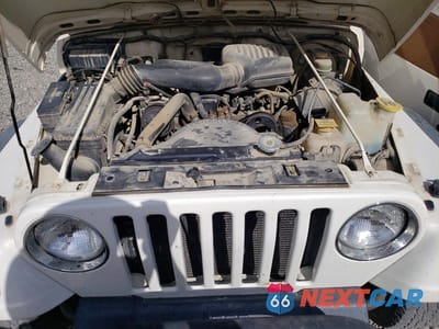 Zdjęcie 11 z 12 samochodu: 1997 JEEP WRANGLER / TJ SE VIN:1J4FY29P3VP418690 - miniatura