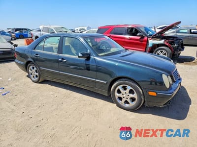 Czwarte zdjęcie samochodu z boku: 2002 MERCEDES-BENZ E 320 VIN:WDBJF65J72B469924 - miniatura