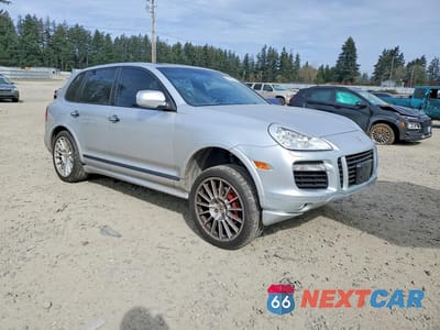 Czwarte zdjęcie samochodu z boku: 2010 PORSCHE CAYENNE GTS VIN:WP1AD2APXALA61550 - miniatura