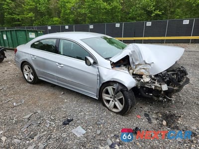Czwarte zdjęcie samochodu z boku: 2014 VOLKSWAGEN CC SPORT VIN:WVWBP7AN1EE505529 - miniatura
