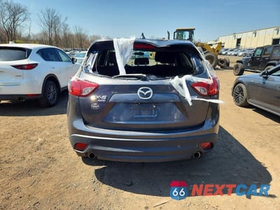 Zdjęcie 6 z 11 samochodu: 2014 MAZDA CX-5 TOURING VIN:JM3KE4CY0E0331159 - miniatura