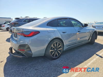 Trzecie zdjęcie samochodu z tyłu: 2022 BMW I4 EDRIVE 40 VIN:WBY73AW00NFN15473 - miniatura