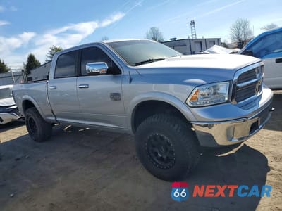 Czwarte zdjęcie samochodu z boku: 2013 RAM 1500 LONGHORN VIN:1C6RR6WT9DS661478 - miniatura