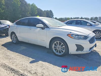 Czwarte zdjęcie samochodu z boku: 2019 FORD FUSION SE VIN:3FA6P0LU4KR120221 - miniatura