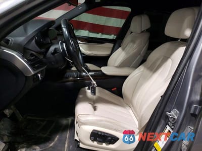 Zdjęcie 7 z 13 samochodu: 2014 BMW X5 XDRIVE50I VIN:5UXKR6C54E0C02664 - miniatura