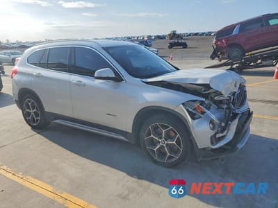 Czwarte zdjęcie samochodu z boku: 2016 BMW X1 XDRIVE28I VIN:WBXHT3C37GP881270 - miniatura