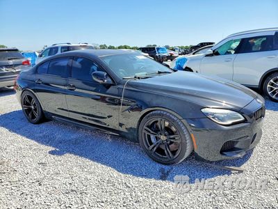 Czwarte zdjęcie samochodu z boku: 2016 BMW M6 GRAN COUPE VIN:WBS6E9C54GG437047 - miniatura