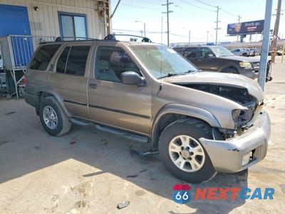 Czwarte zdjęcie samochodu z boku: 2001 NISSAN PATHFINDER SE VIN:JN8DR09XX1W568265 - miniatura