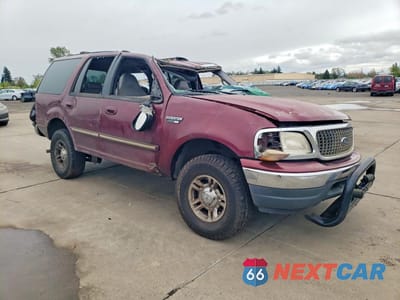 Czwarte zdjęcie samochodu z boku: 2001 FORD EXPEDITION XLT VIN:1FMFU16LX1LA85141 - miniatura