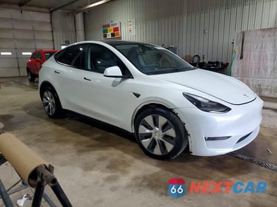 Czwarte zdjęcie samochodu z boku: 2023 TESLA MODEL Y VIN:7SAYGDEEXPF890340 - miniatura
