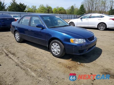 Czwarte zdjęcie samochodu z boku: 2002 TOYOTA COROLLA LE VIN:2T1BR18E32C555215 - miniatura