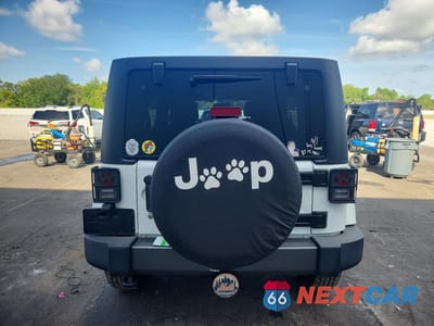 Zdjęcie 6 z 11 samochodu: 2015 JEEP WRANGLER UNLIMITED SPORT VIN:1C4BJWDG1FL572816 - miniatura