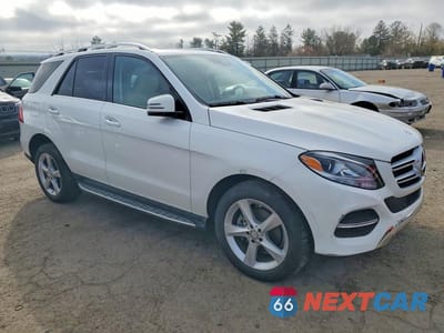 Czwarte zdjęcie samochodu z boku: 2016 MERCEDES-BENZ GLE 300D 4MATIC VIN:4JGDA0EB5GA622196 - miniatura