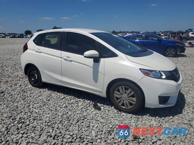 Czwarte zdjęcie samochodu z boku: 2017 HONDA FIT LX VIN:JHMGK5H55HS021818 - miniatura
