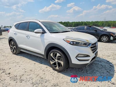 Czwarte zdjęcie samochodu z boku: 2017 HYUNDAI TUCSON LIMITED VIN:KM8J33A23HU563346 - miniatura