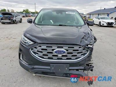 Piąte zdjęcie samochodu w środku: 2022 FORD EDGE TITANIUM VIN:2FMPK4K92NBA38357 - miniatura