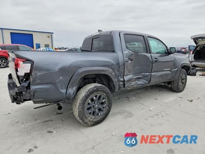 Trzecie zdjęcie samochodu z tyłu: 2023 TOYOTA TACOMA SR5 V6 VIN:3TMAZ5CN3PM201428 - miniatura