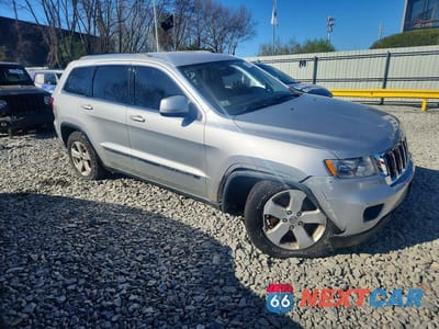 Czwarte zdjęcie samochodu z boku: 2011 JEEP GRAND CHEROKEE LAREDO VIN:1J4RR4GT5BC543232 - miniatura