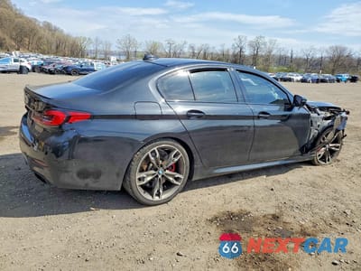 Trzecie zdjęcie samochodu z tyłu: 2021 BMW M550XI VIN:WBA13BK00MCF05464 - miniatura