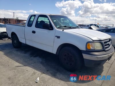 Czwarte zdjęcie samochodu z boku: 2000 FORD F150 VIN:1FTPX17L2YNC24160 - miniatura