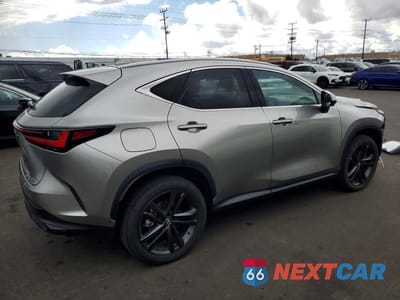 Trzecie zdjęcie samochodu z tyłu: 2025 LEXUS NX 450H+ BASE VIN:JTJHKCFZ7S2056056 - miniatura