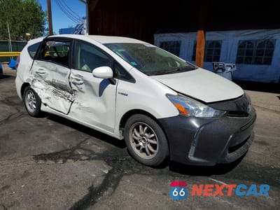 Czwarte zdjęcie samochodu z boku: 2015 TOYOTA PRIUS V THREE VIN:JTDZN3EU9FJ018487 - miniatura