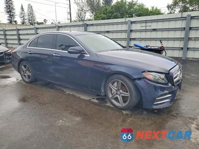 Czwarte zdjęcie samochodu z boku: 2017 MERCEDES-BENZ E 300 4MATIC VIN:WDDZF4KB8HA065248 - miniatura