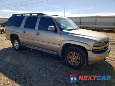 Czwarte zdjęcie samochodu z boku: 2002 CHEVROLET SUBURBAN K1500 VIN:3GNFK16Z22G335833 - miniatura