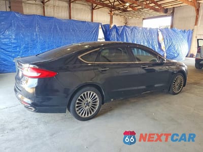 Trzecie zdjęcie samochodu z tyłu: 2018 FORD FUSION TITANIUM VIN:3FA6P0D96JR219695 - miniatura