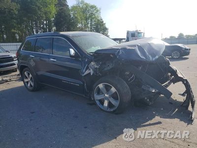 Czwarte zdjęcie samochodu z boku: 2014 JEEP GRAND CHEROKEE LIMITED VIN:1C4RJEBG6EC191313 - miniatura