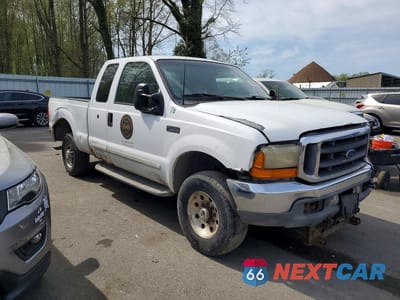 Czwarte zdjęcie samochodu z boku: 2001 FORD F250 SUPER DUTY VIN:1FTNX21L81EC98453 - miniatura
