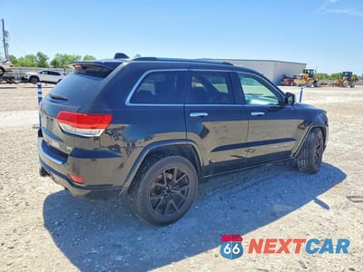 Trzecie zdjęcie samochodu z tyłu: 2014 JEEP GRAND CHEROKEE OVERLAND VIN:1C4RJECT7EC338315 - miniatura