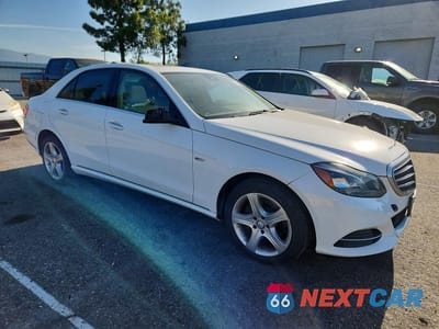 Czwarte zdjęcie samochodu z boku: 2015 MERCEDES-BENZ E 250 BLUETEC VIN:WDDHF0EB4FB129714 - miniatura