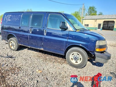 Czwarte zdjęcie samochodu z boku: 2014 GMC SAVANA G3500 VIN:1GTZ7TCG0E1190719 - miniatura