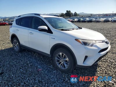 Czwarte zdjęcie samochodu z boku: 2018 TOYOTA RAV4 HYBRID LE VIN:JTMRJREV1JD179222 - miniatura