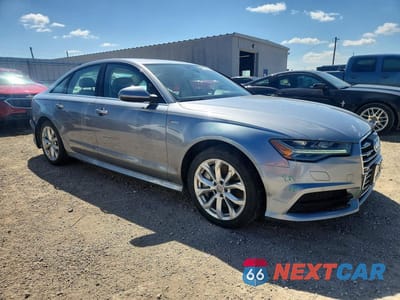 Czwarte zdjęcie samochodu z boku: 2017 AUDI A6 PRESTIGE VIN:WAUH2AFC5HN102569 - miniatura